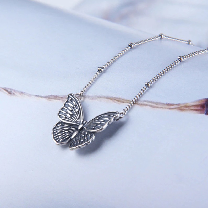 Elegant Sterling Silver Plated Butterfly Spawn Pendant Choker - Image 3